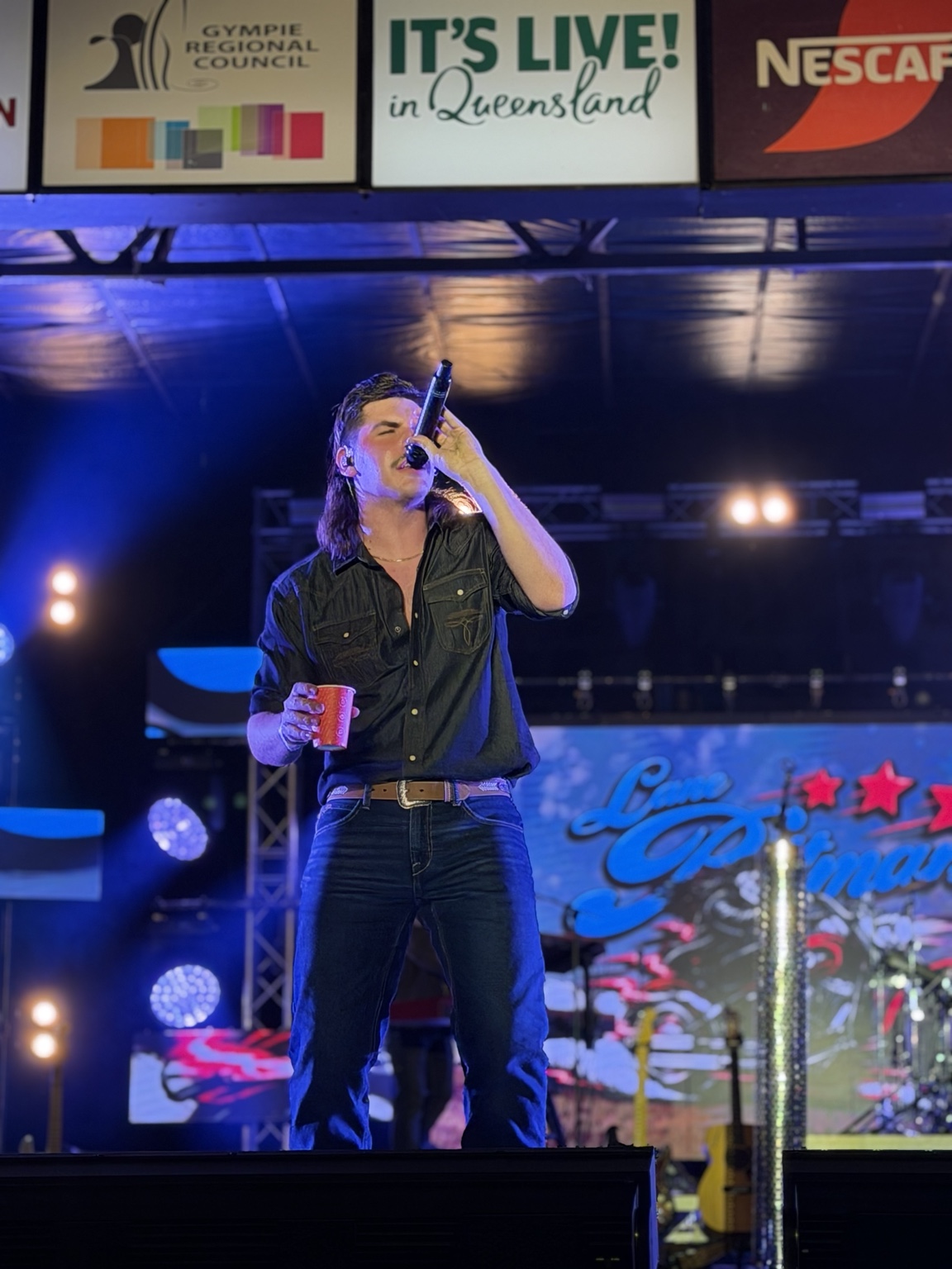 Country singer performing live